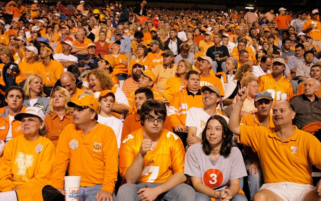 UT fans at Neyland Stadium wearing the school colors.