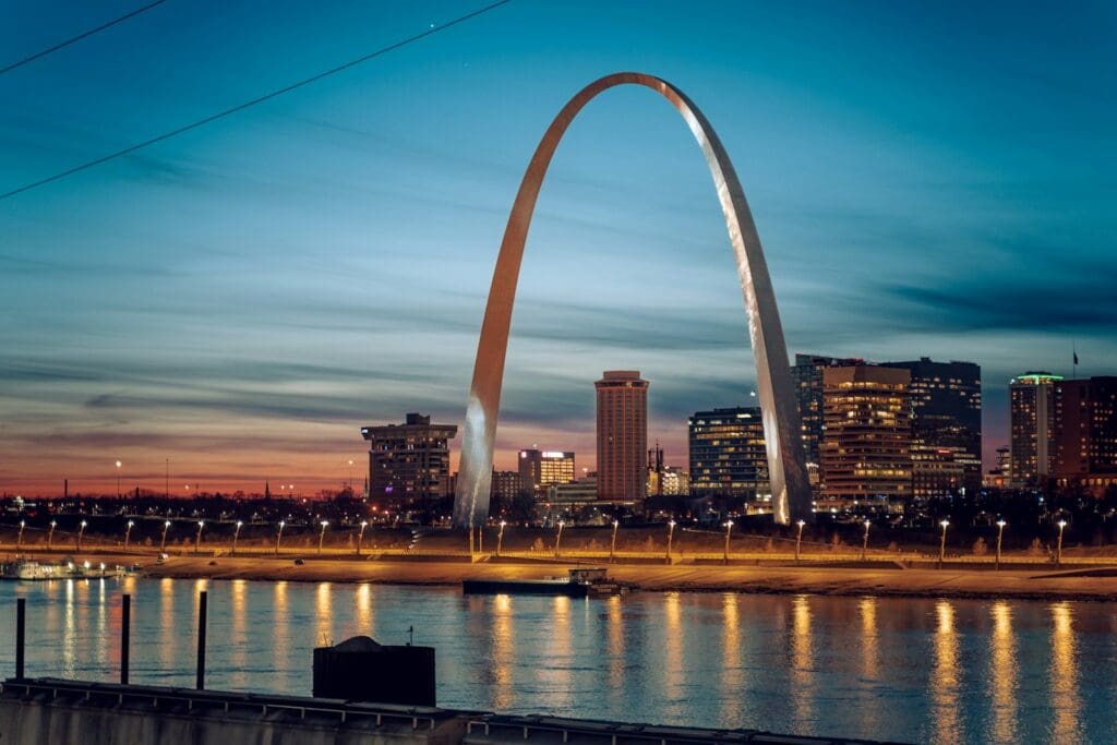 the st louis arch is lit up at night,St. Louis, Missouri