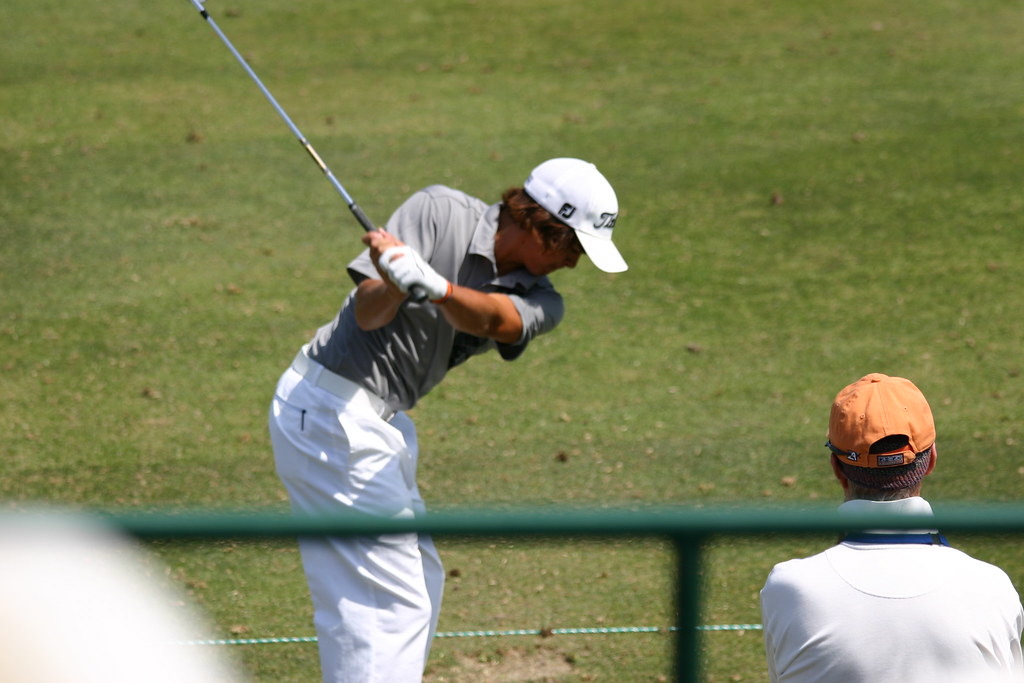 Rickie Fowler - he plopped right next to Tiger on the range and just hit wedges enjoying the scene