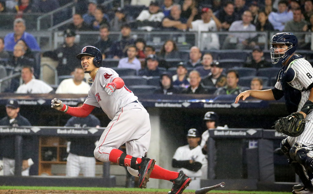 Red Sox outfielder Mookie Betts hits a go-ahead, two-run double in the eighth inning.