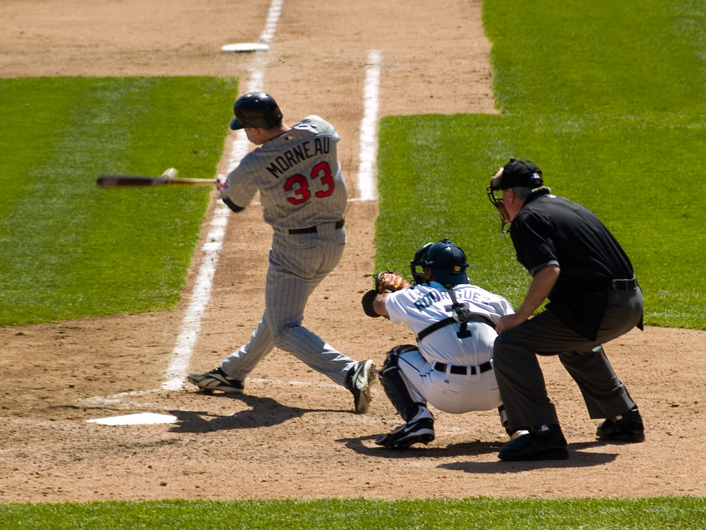 Justin Morneau way out in front of a pitch, Comerica Park, Detroit, April 2007