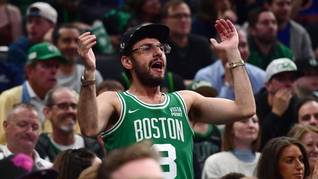 May 14, 2025; Boston, Massachusetts, USA; A Boston Celtics fan cheers in the second half during game five of the second round for the 2025 NBA Playoffs against the New York Knicks at TD Garden.