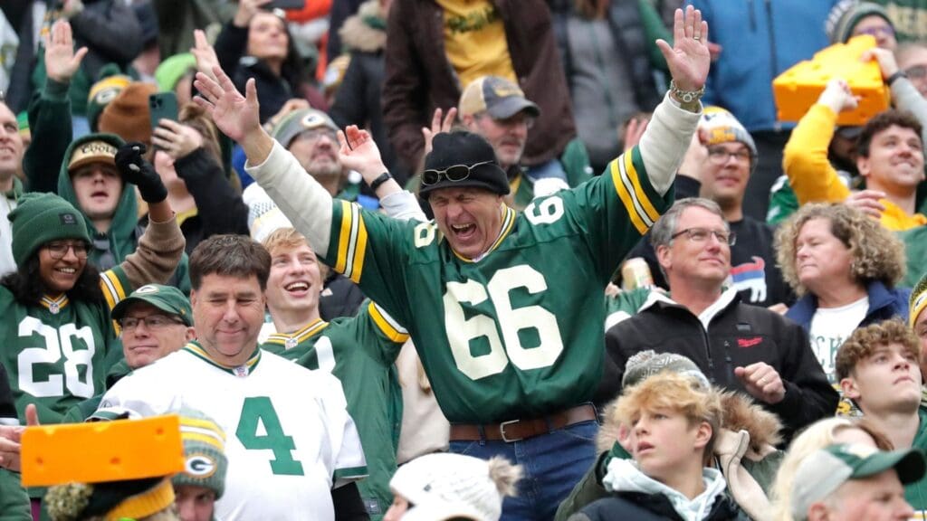 A Green Bay Packers fan is fired up late in the game as the Packers lead the Los Angeles Rams during their football game at Lambeau Field in Green Bay