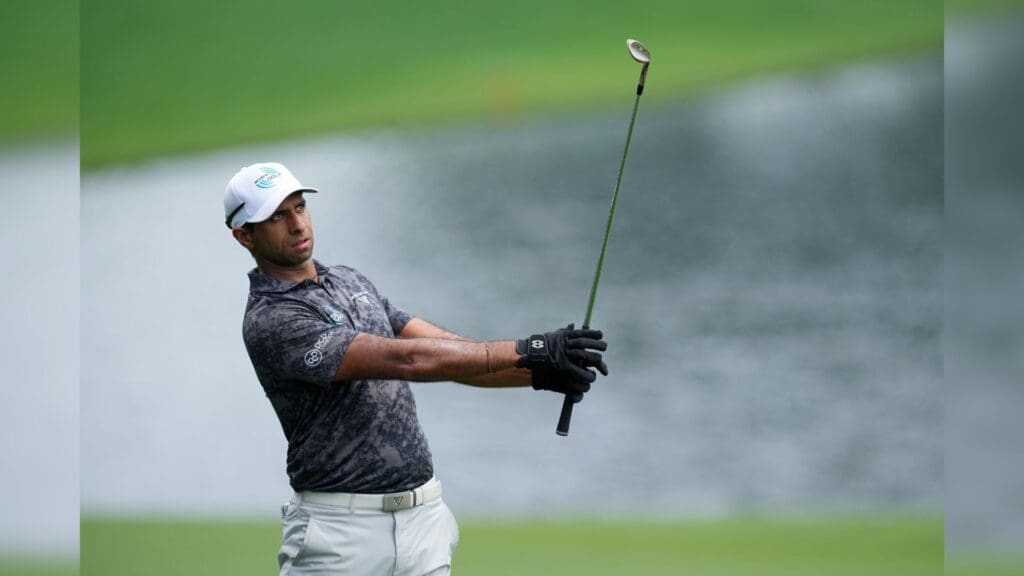 May 18, 2025; Charlotte, North Carolina, USA; Aaron Rai takes a shot on the 15th fairway during the final round of the PGA Championship golf tournament at Quail Hollow.