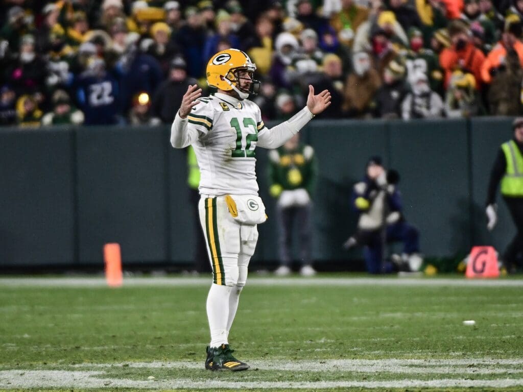 Nov 17, 2022; Green Bay, Wisconsin, USA; Green Bay Packers quarterback Aaron Rodgers (12) reacts after throwing an incomplete pass on fourth down late in the fourth quarter against the Tennessee Titans at Lambeau Field.
