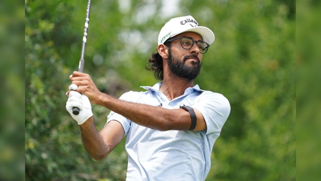 May 24, 2025; Fort Worth, Texas, USA; Akshay Bhatia watches his shot from the ninth tee during the third round of the Charles Schwab Challenge golf tournament.