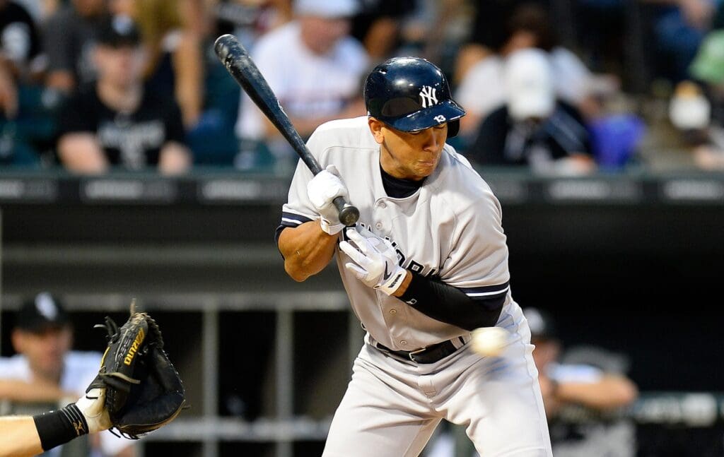 Aug 6, 2013; Chicago, IL, USA; New York Yankees third baseman Alex Rodriguez (13) is hit by a pitch from Chicago White Sox starting pitcher Chris Sale (not pictured) during the third inning at U.S. Cellular Field.