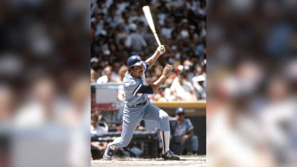 Jul 1983; Cleveland, OH; USA; FILE PHOTO; Kansas City Royals outfielder Amos Otis hits the ball against the Cleveland Indians at Cleveland Stadium.