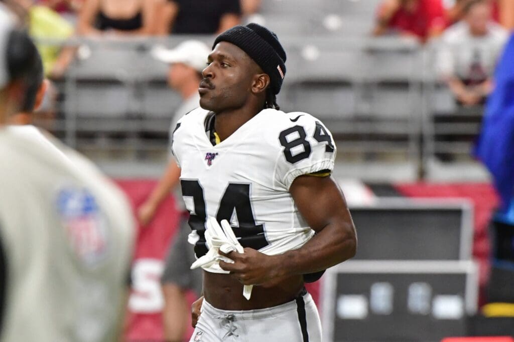 Aug 15, 2019; Glendale, AZ, USA; Oakland Raiders wide receiver Antonio Brown (84) takes the field at the start of the game against the Arizona Cardinals during a preseason game at State Farm Stadium.
