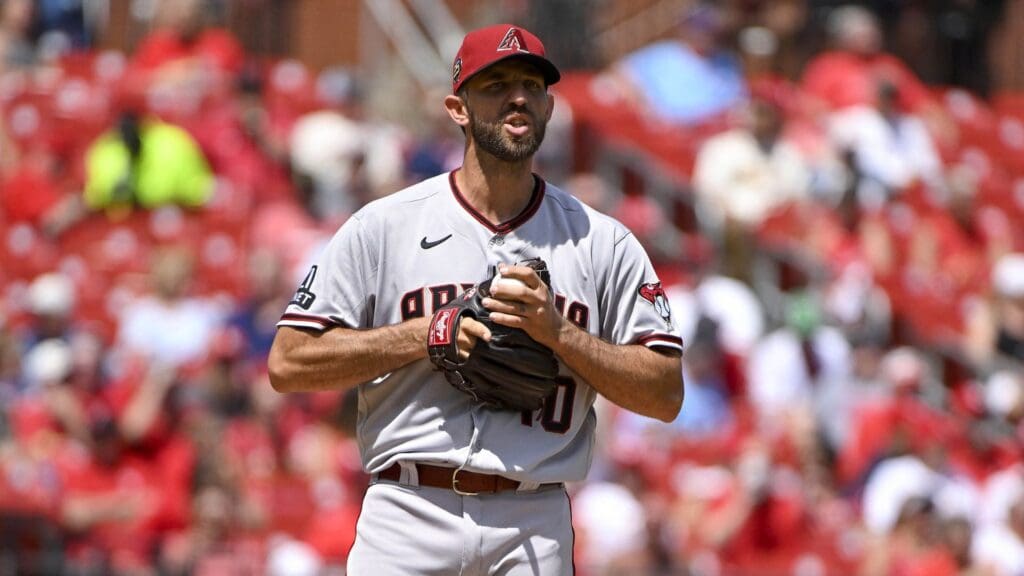 Apr 19, 2023; St. Louis, Missouri, USA; Arizona Diamondbacks starting pitcher Madison Bumgarner (40) exchanges words with St. Louis Cardinals designated hitter Willson Contreras (not pictured) during the third inning at Busch Stadium.