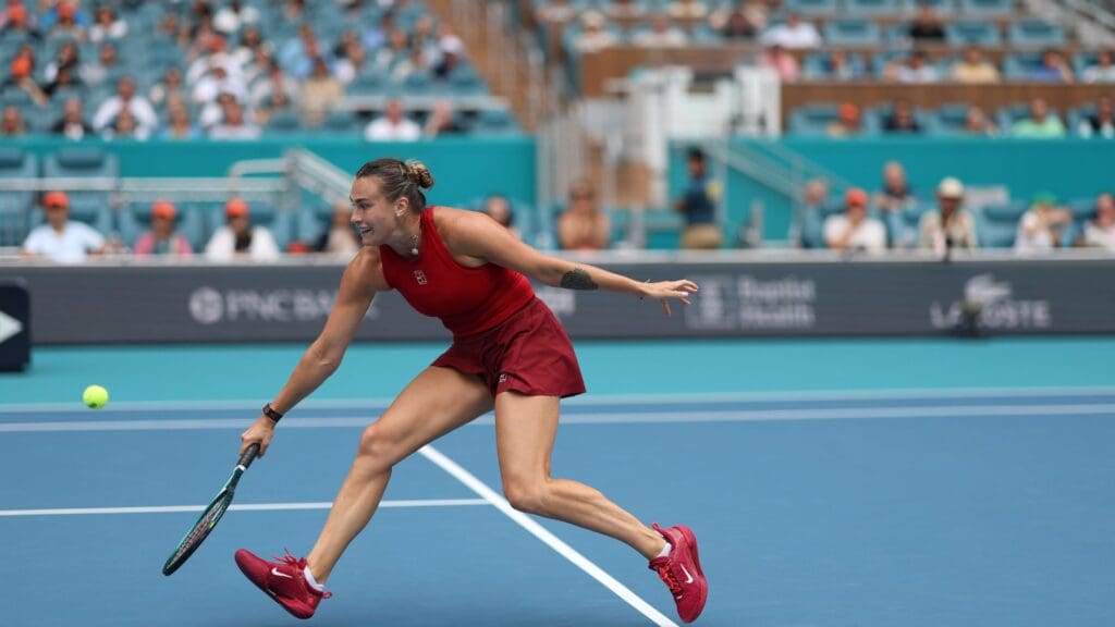 Mar 29, 2025; Miami, FL, USA; Aryna Sabalenka reaches for a backhand against Jessica Pegula (USA)(not pictured) in the women's singles championship of the Miami Open at Hard Rock Stadium.