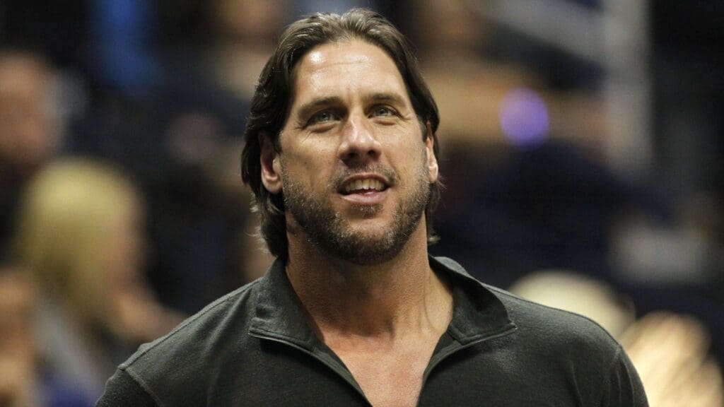 Atlanta Braves former relief pitcher John Rocker watches a game between the Miami Heat and Atlanta Hawks in the first quarter at Philips Arena.