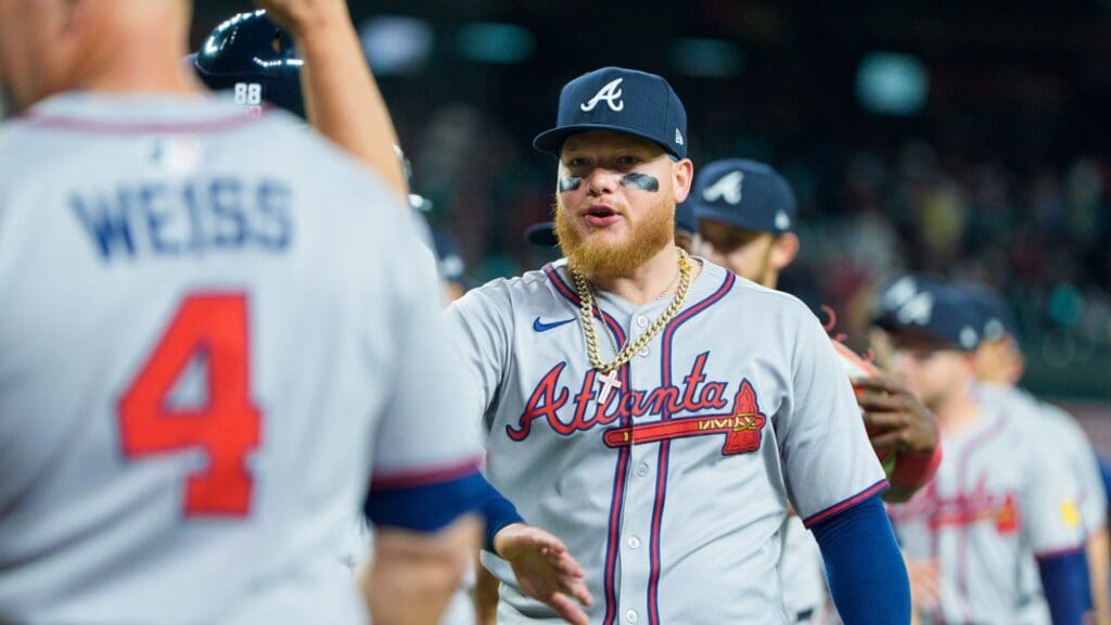 Apr 26, 2025; Phoenix, Arizona, USA; Atlanta Braves outfielder Alex Verdugo (8) celebrates with his team after beating the Arizona Diamondbacks 8-7 after ten innings at Chase Field.