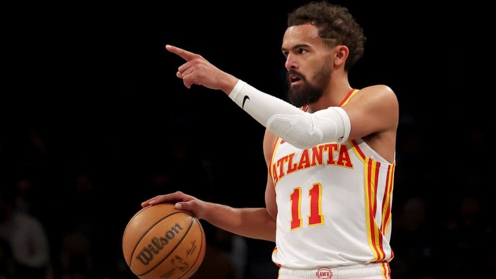 Apr 10, 2025; Brooklyn, New York, USA; Atlanta Hawks guard Trae Young (11) controls the ball against the Brooklyn Nets during the third quarter at Barclays Center.
