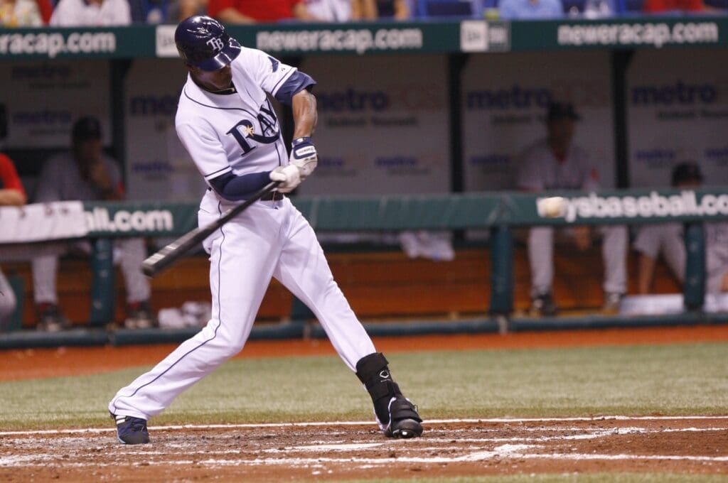 August 5, 2009; St. Petersburg, FL, USA; Tampa Bay Rays center fielder B.J. Upton (2) hits a single in the fourth inning during their game against the Boston Red Sox at Tropicana Field.