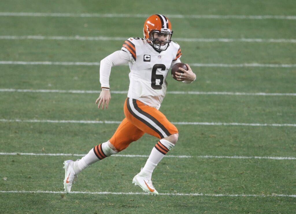 Jan 10, 2021; Pittsburgh, PA, USA; Cleveland Browns quarterback Baker Mayfield (6) runs the ball against the Pittsburgh Steelers in the third quarter of an AFC Wild Card playoff game at Heinz Field.
