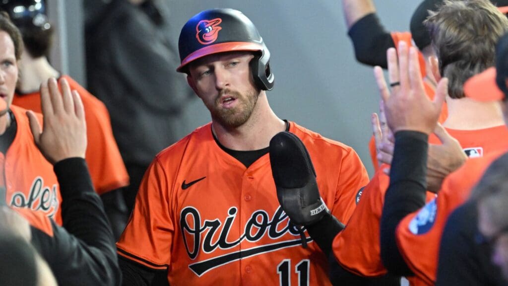 Mar 29, 2025; Toronto, Ontario, CAN; Baltimore Orioles second baseman Jordan Westburg (11) celebrates with team mates in the dugout after scoring against the Toronto Blue Jays in the fifth inning at Rogers Centre