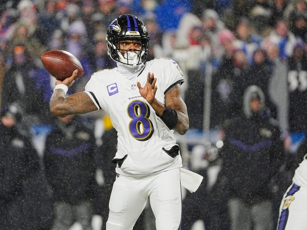 Baltimore Ravens quarterback Lamar Jackson gets off a pass during first half action during the Buffalo Bills divisional game against the Baltimore Ravens at Highmark Stadium in Orchard Park on Jan. 19, 2025.

