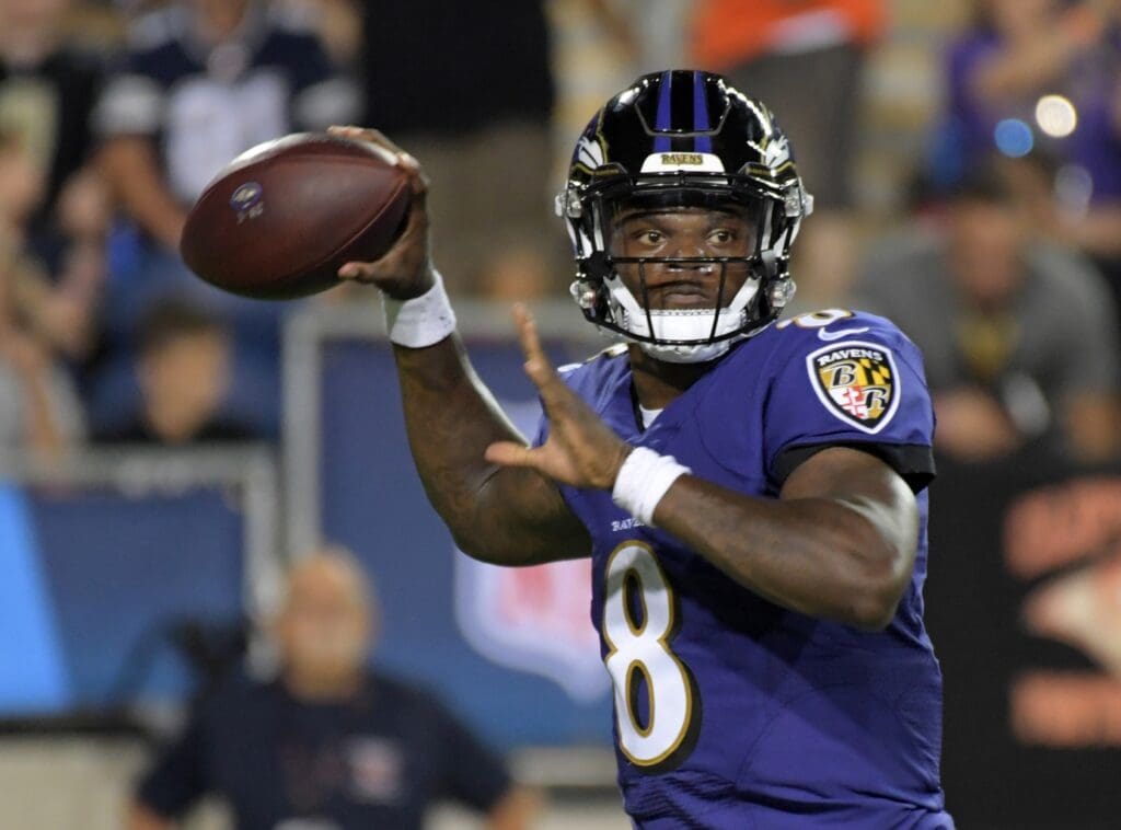 Baltimore Ravens quarterback Lamar Jackson (8) throws a pass against the Chicago Bears during the Hall of Fame Game at Tom Benson Hall of Fame Stadium. The Ravens defeated the Bears 17-16.