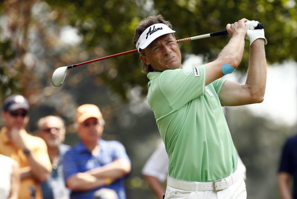 Apr 9, 2015; Augusta, GA, USA; Bernhard Langer hits his tee shot on the 4th hole during the first round of The Masters golf tournament at Augusta National Golf Club.