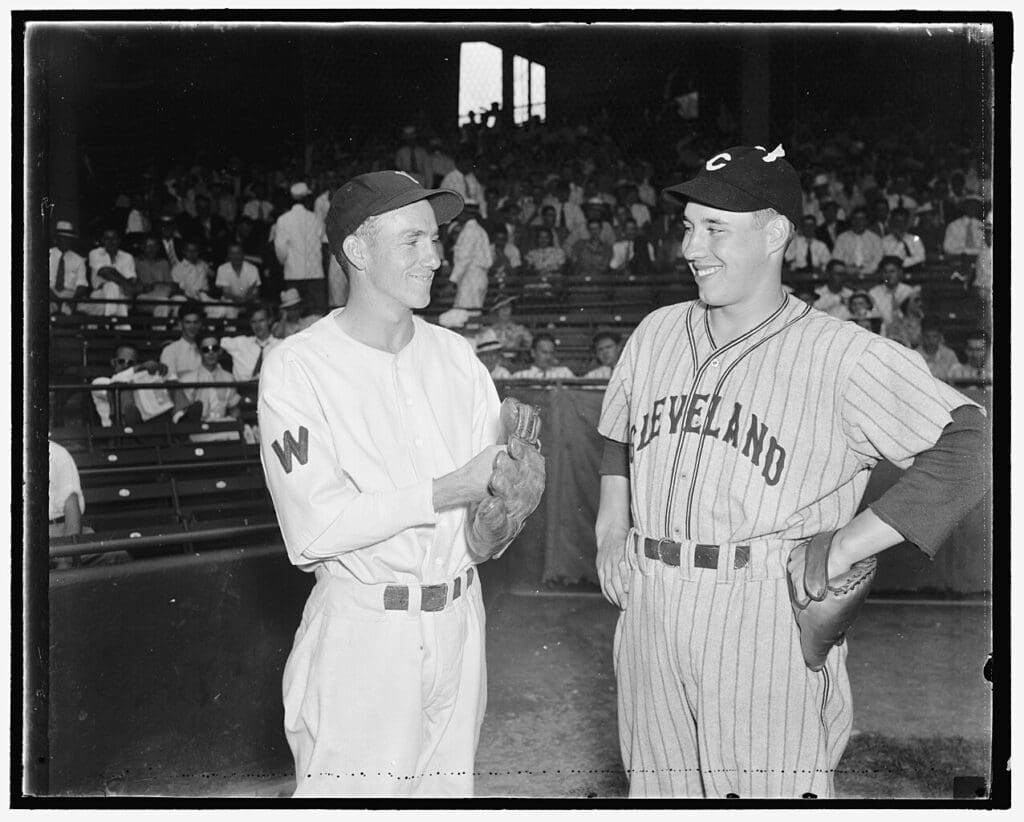 Bucky Jacobs, left, Washington's rookie from Richmond, VA. And Bob Feller, from Cleveland