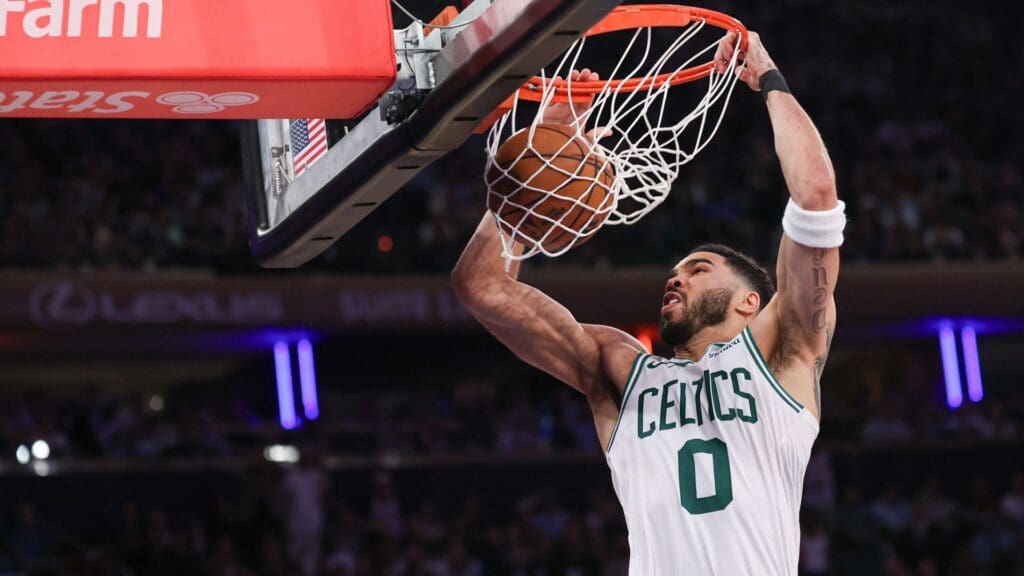 May 12, 2025; New York, New York, USA; Boston Celtics forward Jayson Tatum (0) dunks the ball in the second half during game four of the second round for the 2025 NBA Playoffs against the New York Knicks at Madison Square Garden.