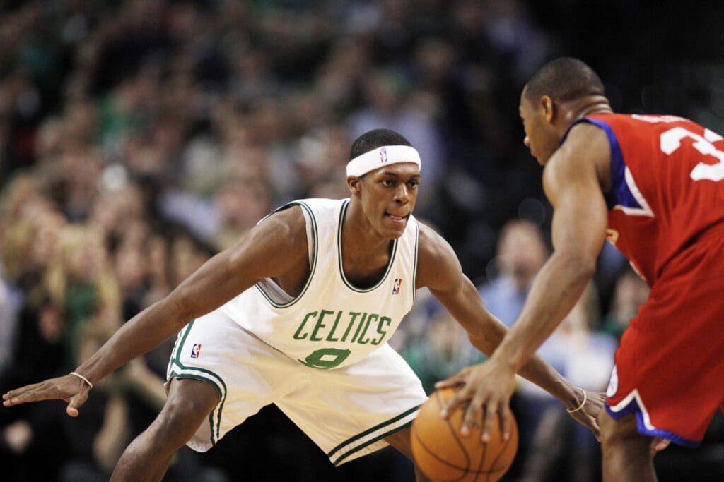 Dec 18, 2009; Boston, MA, USA; Boston Celtics guard Rajon Rondo (9) defends against Philadelphia 76ers guard Willie Green (33) during the second quarter at the TD Banknorth Garden. Philadelphia defeated Boston 98-97.