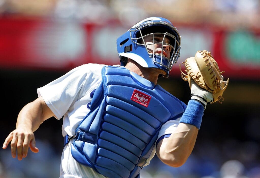 July 1, 2009; Los Angeles, CA, USA; Los Angeles Dodgers catcher Brad Ausmus (12) catches a flyball in the eighth inning against the Colorado Rockies at Dodger Stadium. final