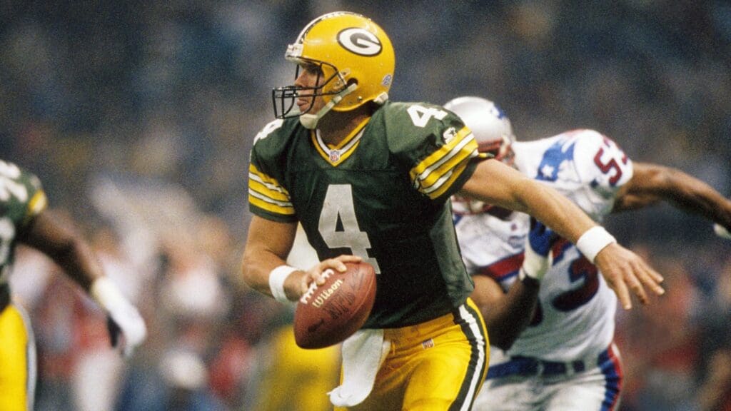 Jan 26, 1997; New Orleans, LA, USA; FILE PHOTO; Green Bay Packers quarterback (4) Brett Favre in action against the New England Patriots during Super Bowl XXXI at the Superdome. The Packers defeated the Patriots 35-21.
