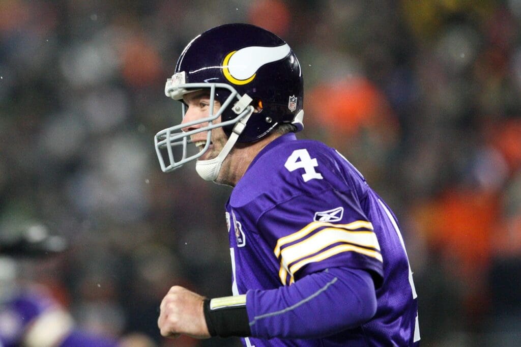 Dec 20, 2010; Minneapolis, MN, USA; Minnesota Vikings quarterback Brett Favre (4) celebrates a touchdown during the first quarter against the Chicago Bears at TCF Bank Stadium. The Bears defeated the Vikings 40-14.