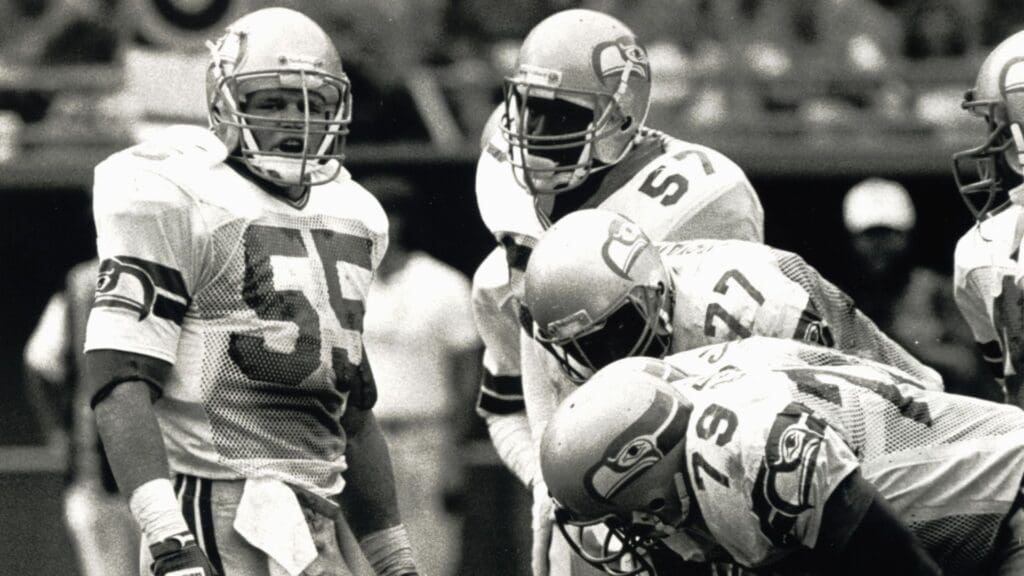 Sep 13, 1987; Denver, CO, USA; FILE PHOTO; Seattle Seahawks linebacker Brian Bosworth (55) calls the defensive formation in the huddle during the 1987 season.