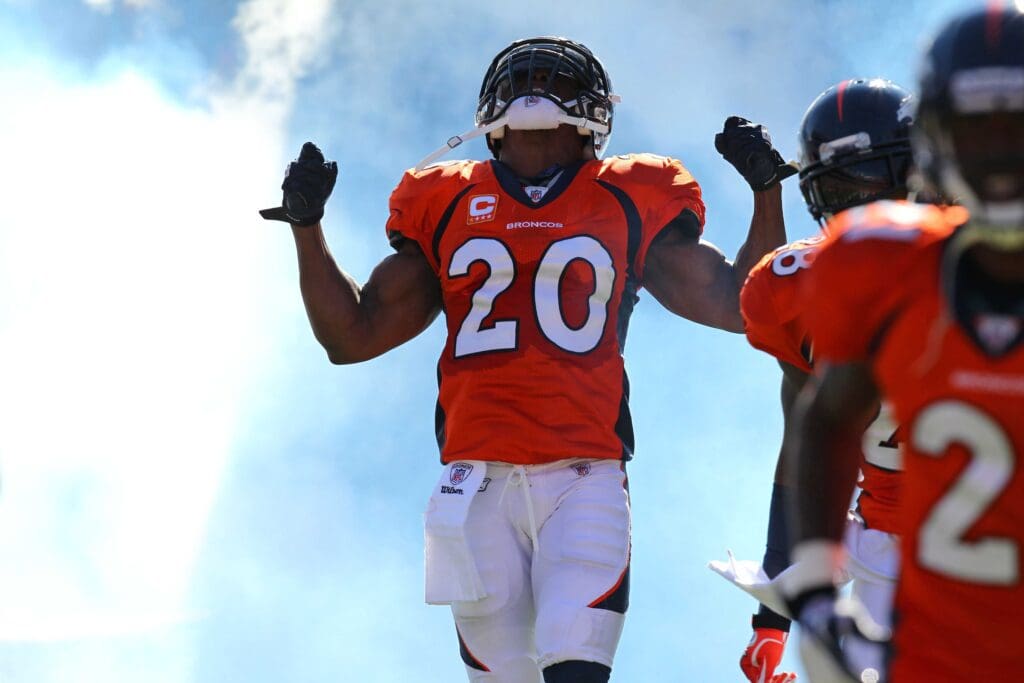 Oct 30, 2011; Denver, CO, USA; Denver Broncos strong safety Brian Dawkins (20) enters the field before the start of the game against the Detroit Lions at Sports Authority Field. The Lions defeated the Broncos 45-10.