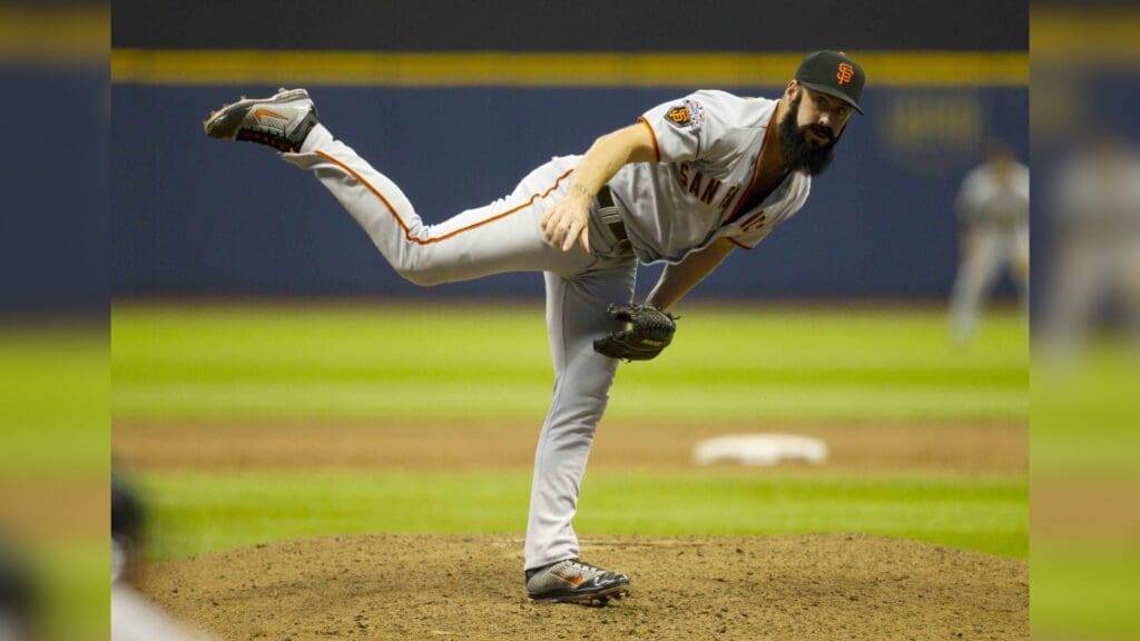 May 27, 2011; Milwaukee, WI, USA; San Francisco Giants pitcher Brian Wilson (38) pitches during the game against the Milwaukee Brewers at Miller Park. The Giants defeated the Brewers 5-4.