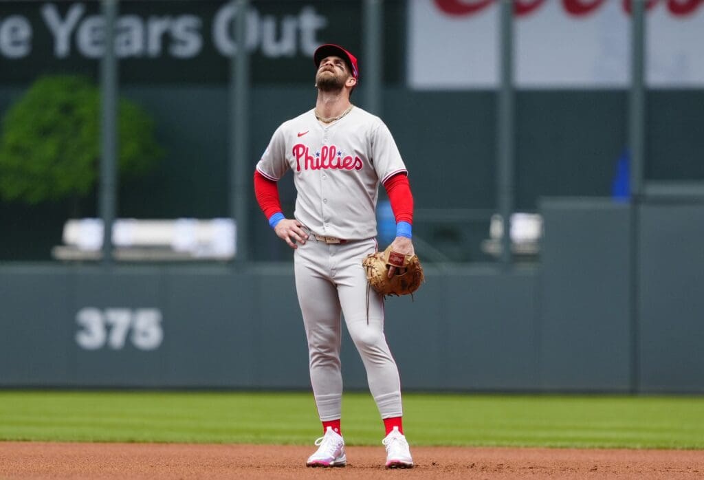 May 22, 2025; Denver, Colorado, USA; Philadelphia Phillies first baseman Bryce Harper (3) looks up in the first inning against the Colorado Rockies at Coors Field.
