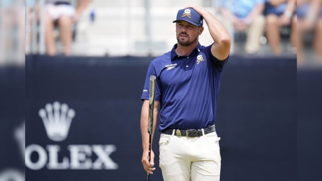 May 18, 2025; Charlotte, North Carolina, USA; Bryson DeChambeau reacts after missing a putt on the second green during the final round of the PGA Championship golf tournament at Quail Hollow.