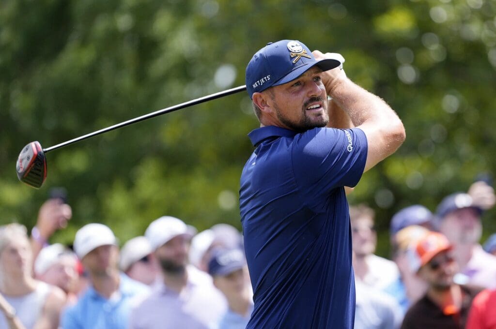 May 18, 2025; Charlotte, North Carolina, USA; Bryson DeChambeau tees off on the third hole during the final round of the PGA Championship golf tournament at Quail Hollow.