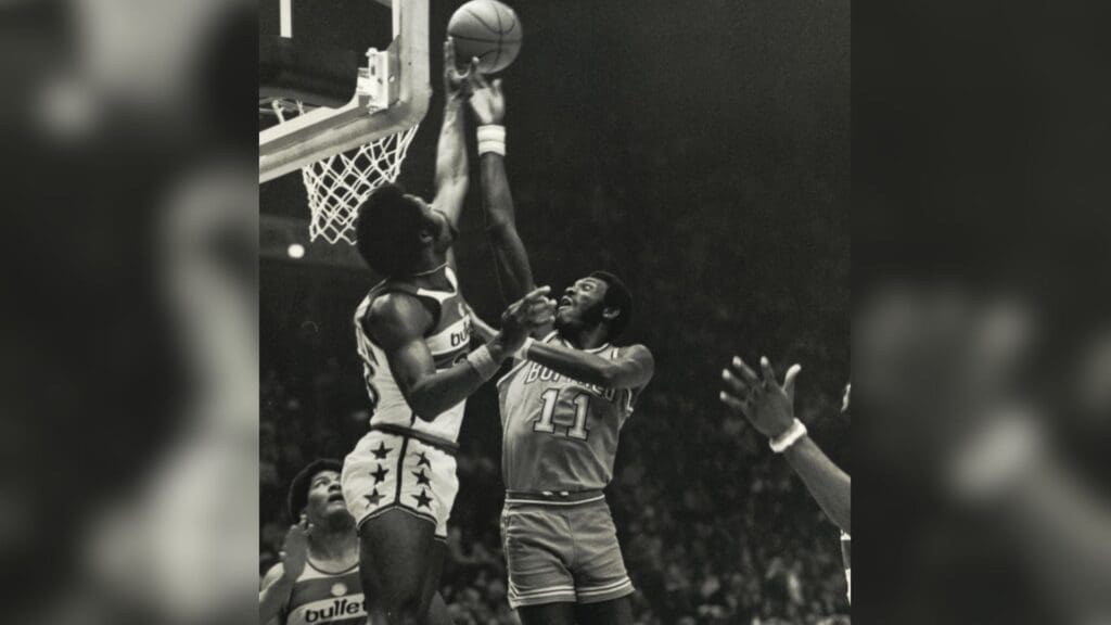 Unknown date & location, USA: FILE PHOTO; Buffalo Braves forward Bob McAdoo (11) shoots against the Washington Bullets. McAdoo was names Rookie of the Year for the 1972-73 season.