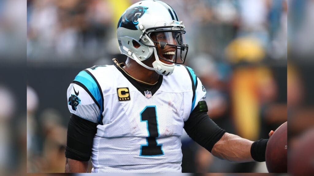 Sep 9, 2018; Charlotte, NC, USA; Carolina Panthers quarterback Cam Newton (1) celebrates after scoring a touchdown in the second quarter against the Dallas Cowboys at Bank of America Stadium.