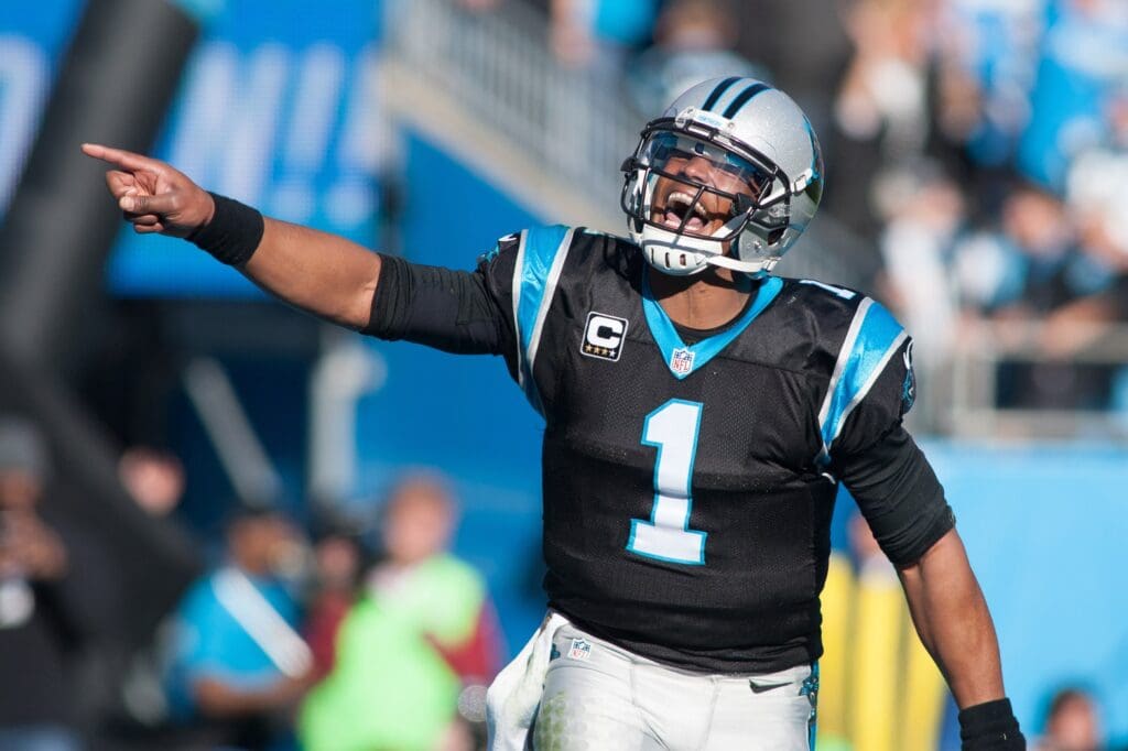 Nov 22, 2015; Charlotte, NC, USA; Carolina Panthers quarterback Cam Newton (1) celebrates after a touchdown during the second quarter against the Washington Redskins at Bank of America Stadium.