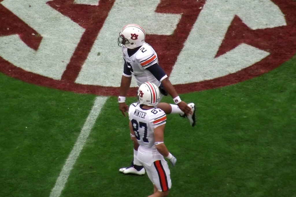 Newton (top) warming up prior to the 2010 Iron Bowl