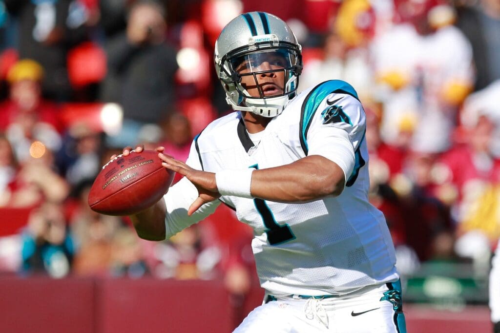 November 4, 2012; Landover, MD, USA; Carolina Panthers quarterback Cam Newton (1) throws the ball against the Washington Redskins at FedEx Field.