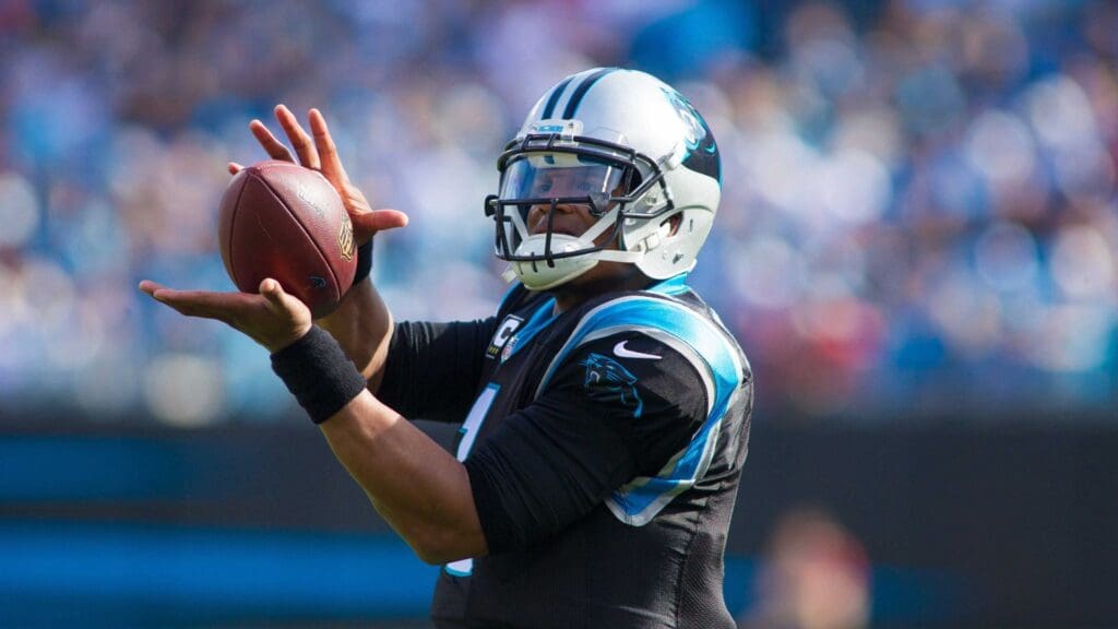 Dec 13, 2015; Charlotte, NC, USA; Carolina Panthers quarterback Cam Newton (1) catches a pass during a timeout in the first quarter against the Atlanta Falcons at Bank of America Stadium. Panthers defeated the Falcons 38-0.