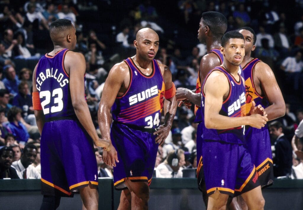 FILE PHOTO; Phoenix Suns forward Charles Barkley (34), Cedric Ceballos (23), Kevin Johnson (7), Oliver Miller and A.C. Green wait during a time-out against the Dallas Mavericks at Reunion Arena during the 1993-94 season.