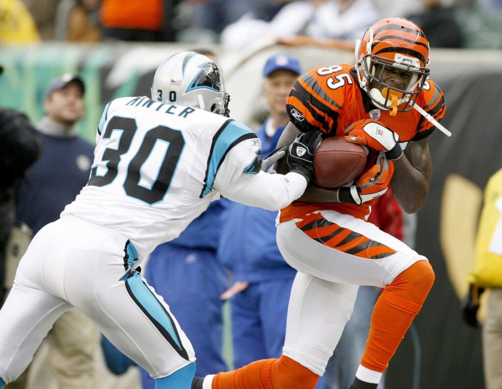 Oct 22, 2006; Cincinnati, OH, USA; Cincinnati Bengals receiver (85) Chad Johnson fights to make a catch against Carolina Panthers safety (30) Mike Minter at Paul Brown Stadium. The play was ruled out of bounds. The Bengals beat the Panthers 17-14. Mandatory Credit: Matthew Emmons-USA TODAY Sports © copyright Matthew Emmons