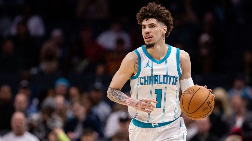 Mar 7, 2025; Charlotte, North Carolina, USA; Charlotte Hornets guard LaMelo Ball (1) brings the ball up court against the Cleveland Cavaliers during the first quarter at Spectrum Center.