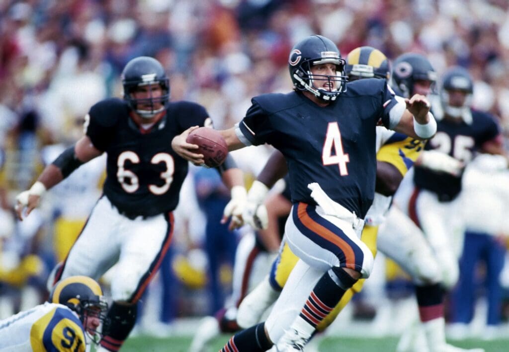 Oct 29, 1989; Chicago, IL, USA; FILE PHOTO; Chicago Bears quarterback Jim Harbaugh (4) in action against the Los Angeles Rams at Soldier Field. The Bears defeated the Rams 20-10.