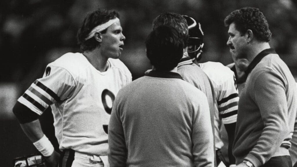 Dec 12, 1982, Seattle, Washington, USA; FILE PHOTO; Chicago Bears quarterback Jim McMahon (9) talks with coaches during the 1982 season game against the Seattle Seahawks at the Kingdome.