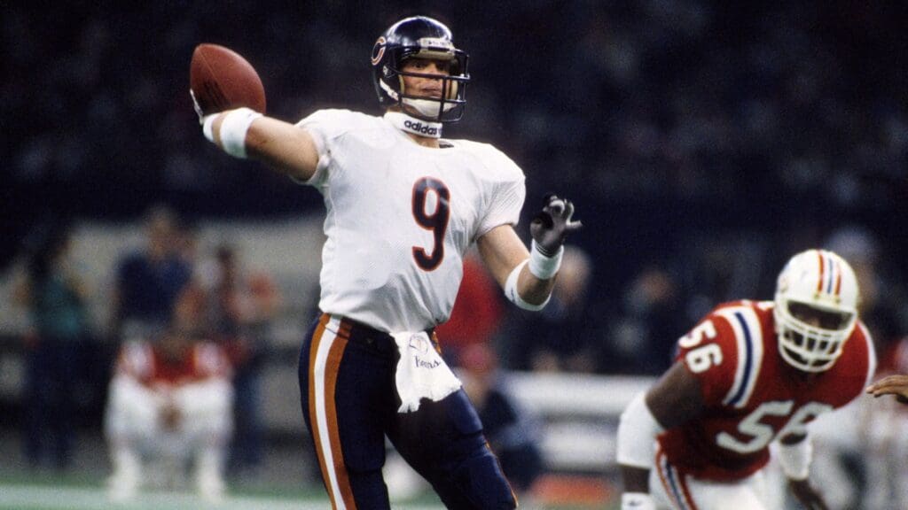 Jan 26, 1986; New Orleans, LA, USA; FILE PHOTO; Chicago Bears quarterback Jim McMahon (9) throws the ball against the New England Patriots during Super Bowl XX at the Superdome. The Bears defeated the Patriots 46-10