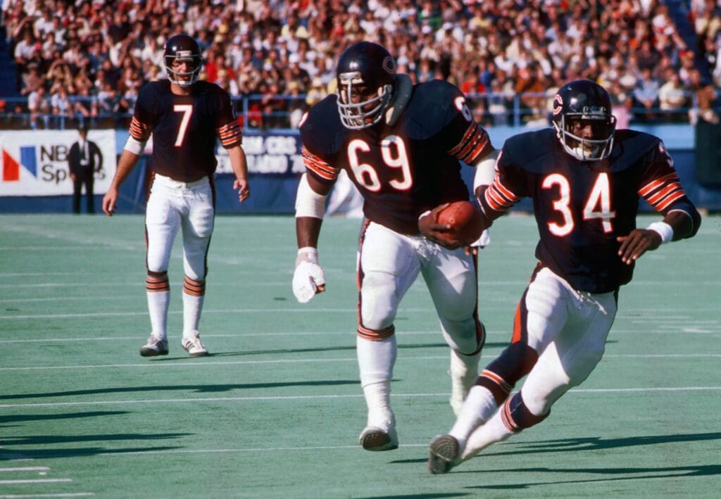 Unknown Date; Chicago, IL, USA; FILE PHOTO; Chicago Bears running back (34) Walter Payton in action Solider Field against the Oakland Raiders.