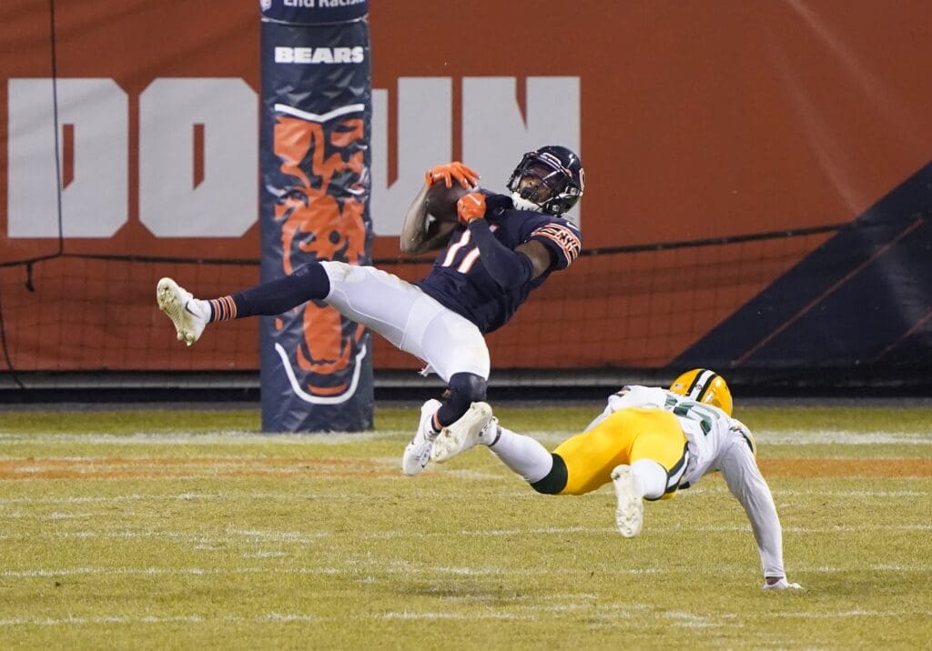 Chicago Bears wide receiver Darnell Mooney (11) makes a catch against Green Bay Packers free safety Darnell Savage (26) during the third quarter at Soldier Field.